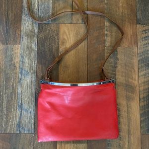 Poppy colored clutch